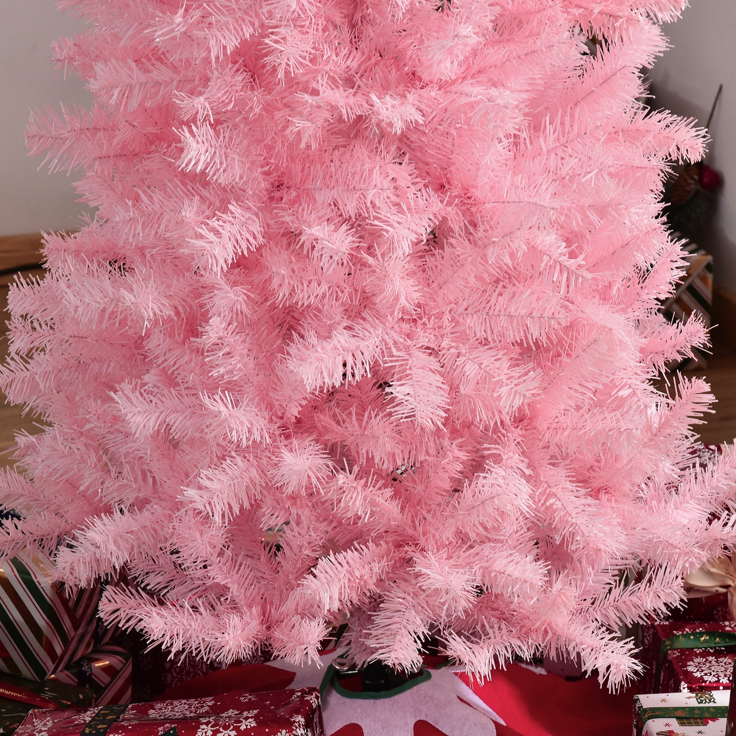 Fluffy pink Christmas tree with dense pine needles perfect for a whimsical holiday decor