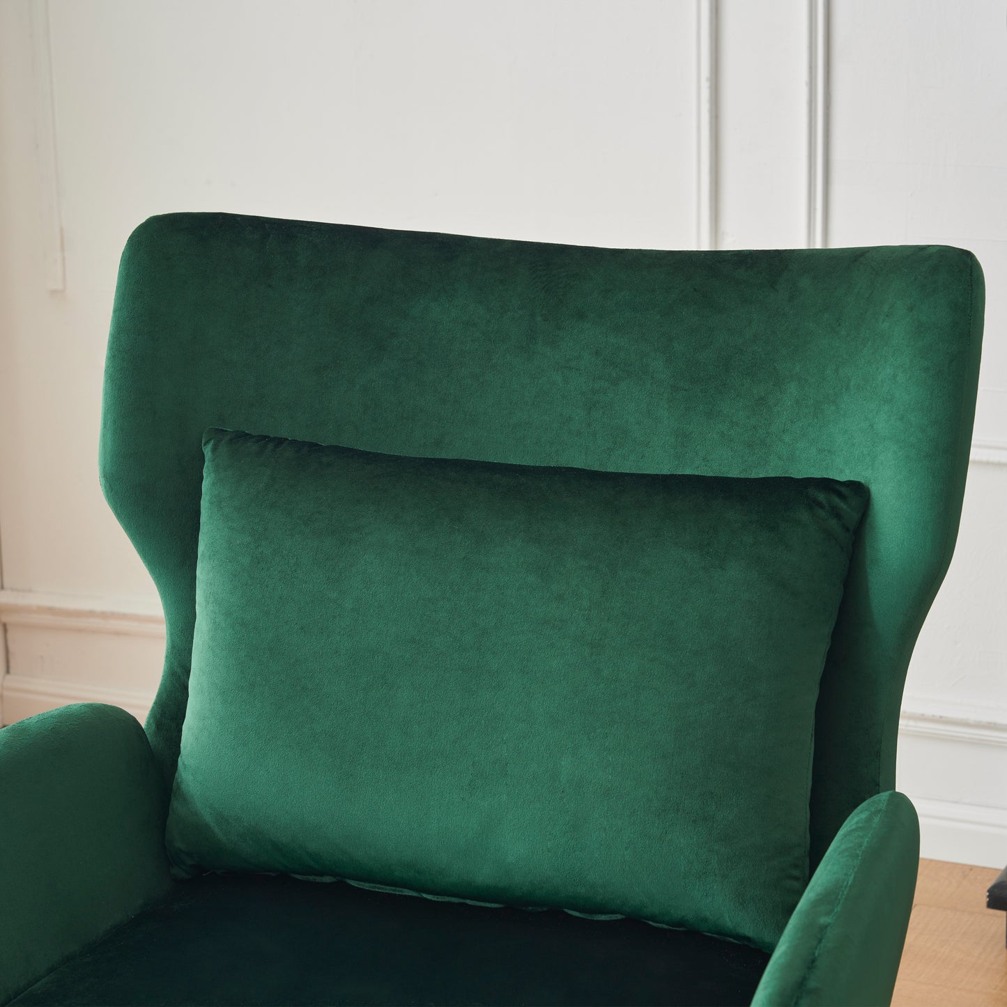 Plush emerald green velvet accent pillow with a smooth soft texture