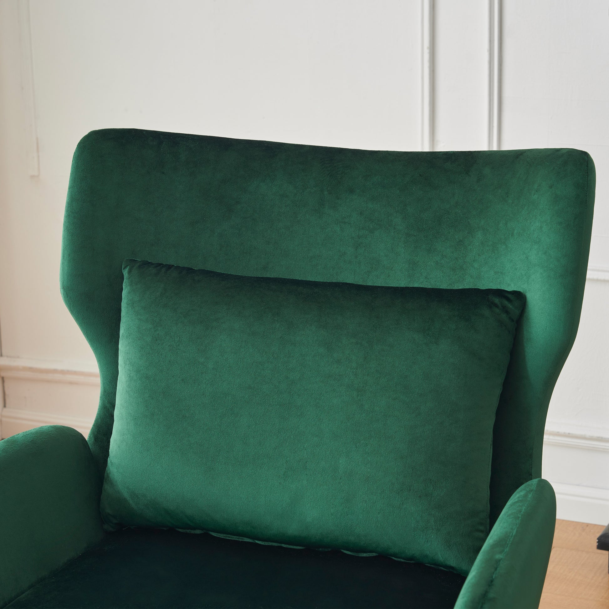 Plush emerald green velvet accent pillow with a smooth soft texture