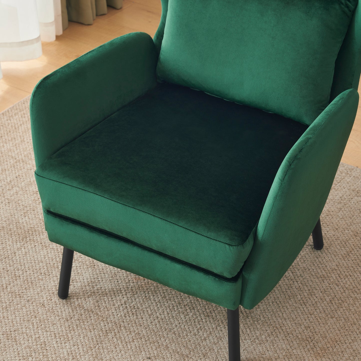 Elegant emerald green velvet accent chair with plush seat and back cushion