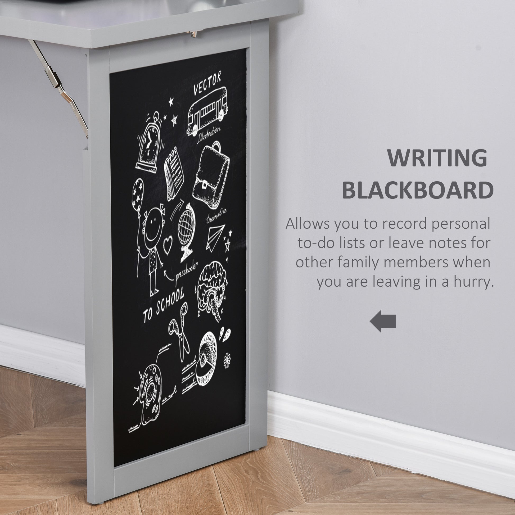 Gray writing blackboard with chalk drawings of school supplies and children