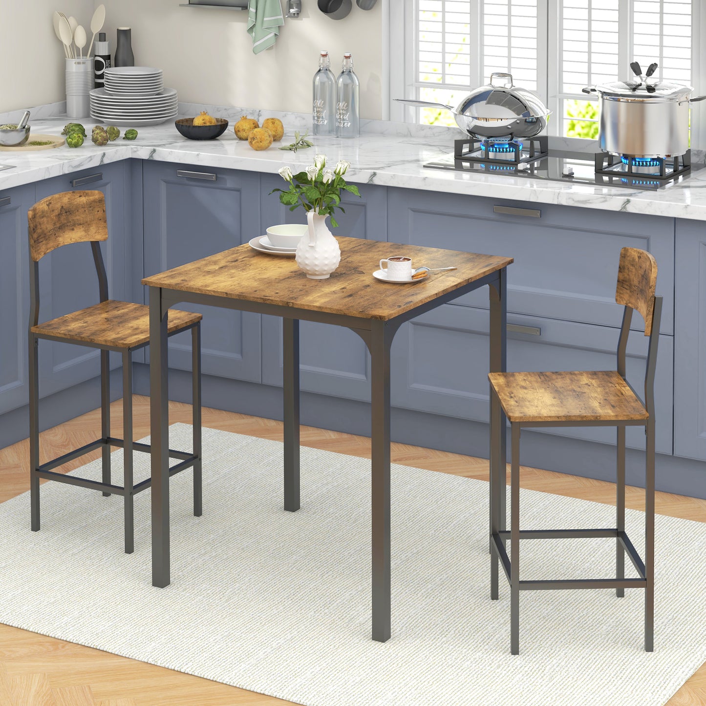 Rustic wood and metal bar table with two matching stools in a modern kitchen setting