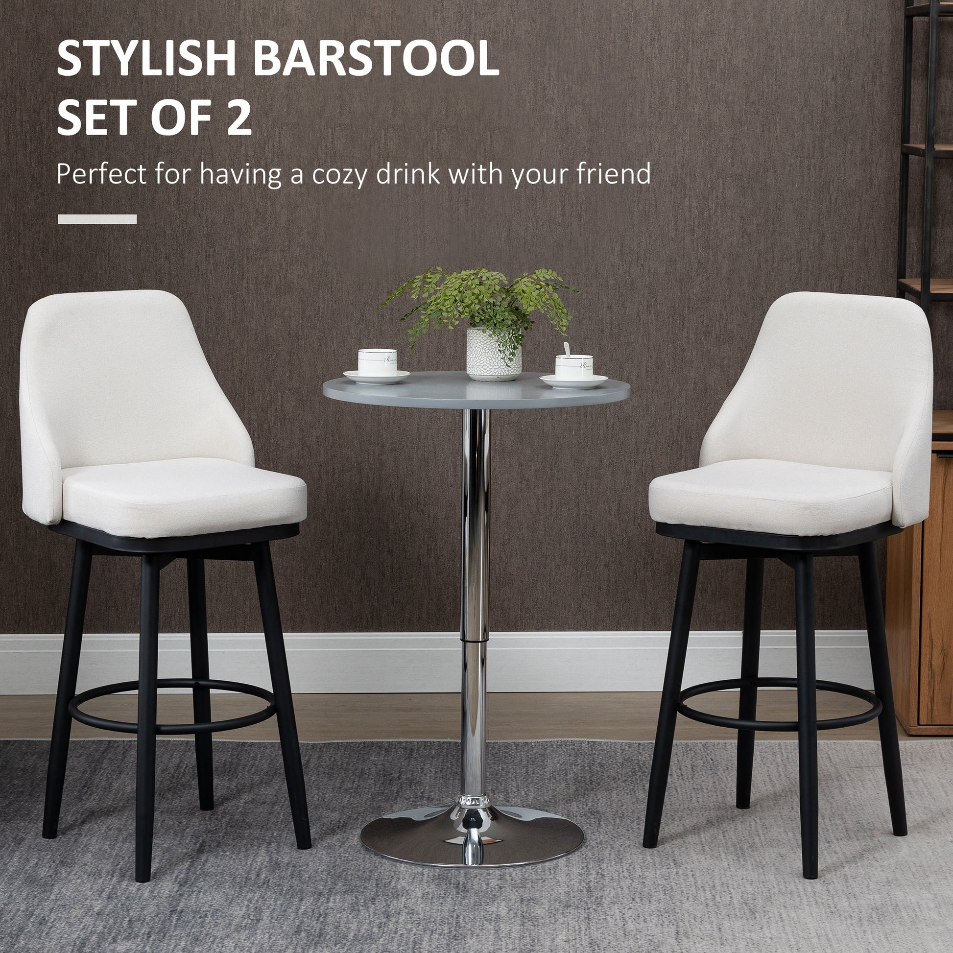 Set of  modern bar stools with cream upholstered seats and black legs perfect for a kitchen counter