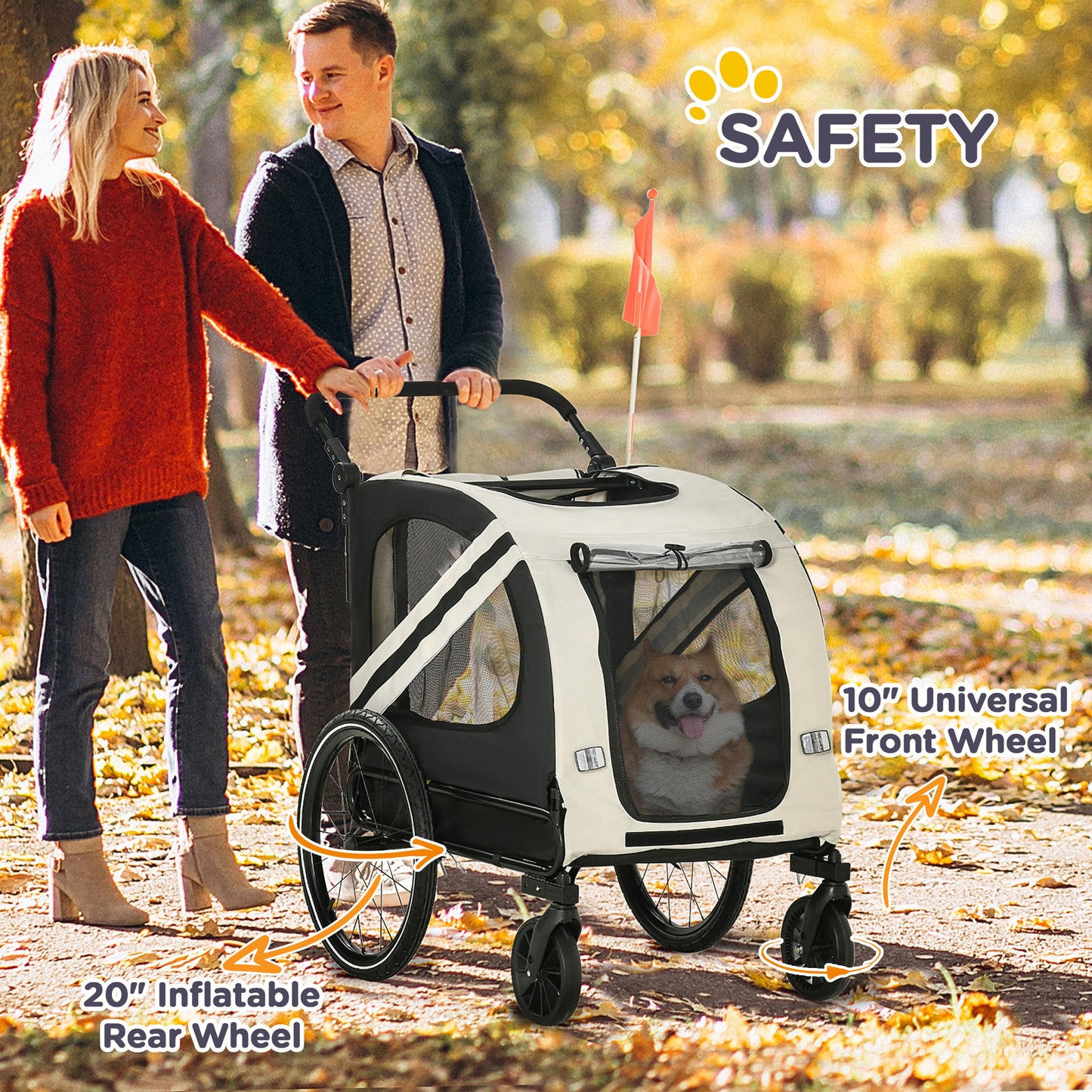 Couple pushing a cream and black dog stroller with a corgi inside
