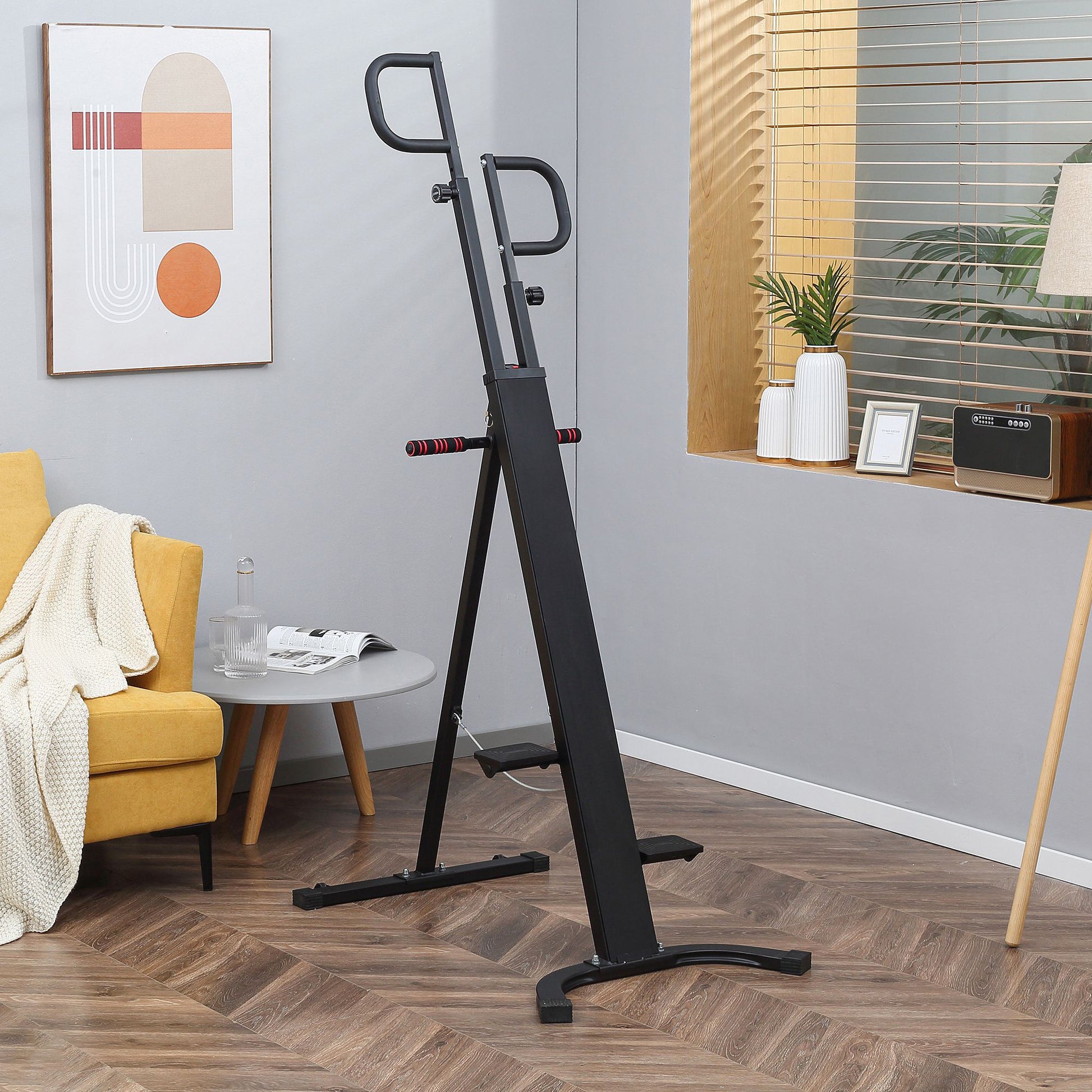 Black vertical climber machine with padded grips for home workouts
