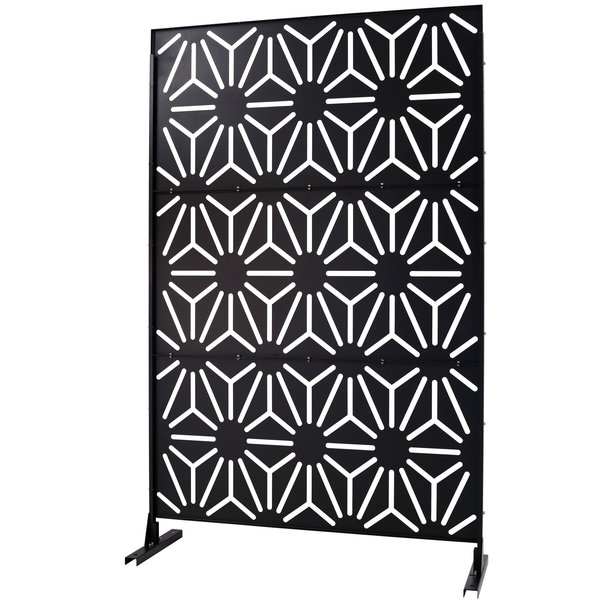 Black metal privacy screen with geometric white cutouts