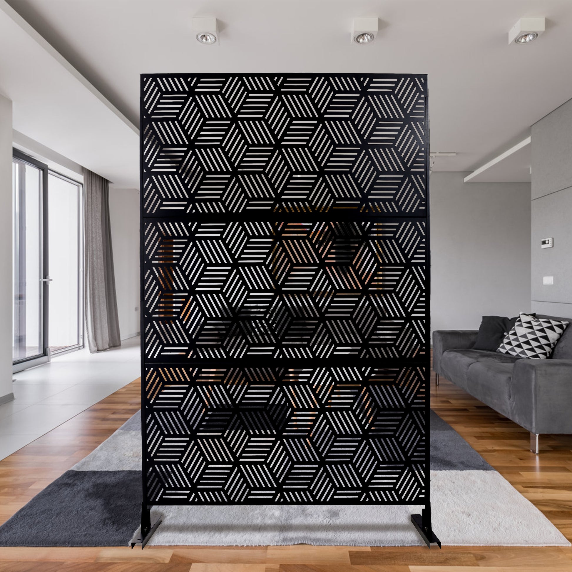 Black geometric room divider with a modern hexagonal pattern perfect for creating distinct spaces