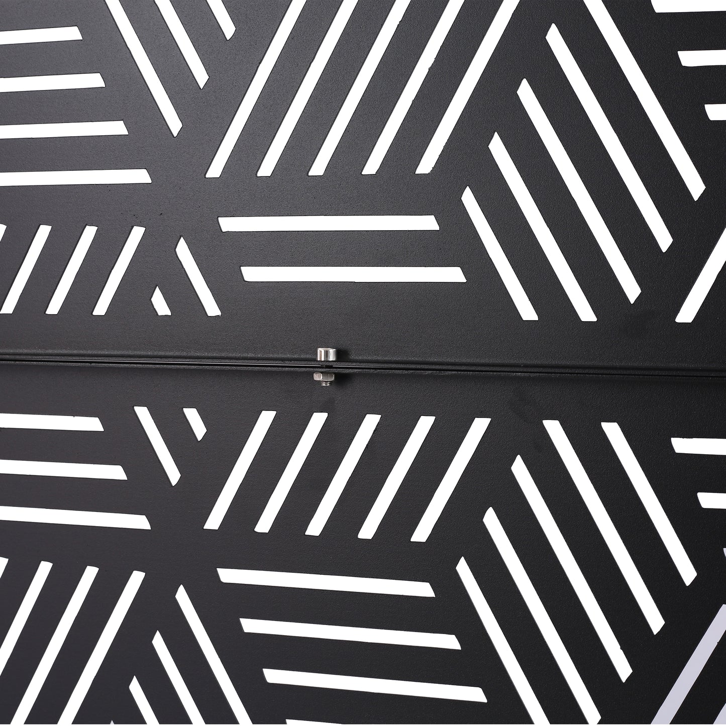 Black metal decorative panel with geometric white cutouts for modern home decor