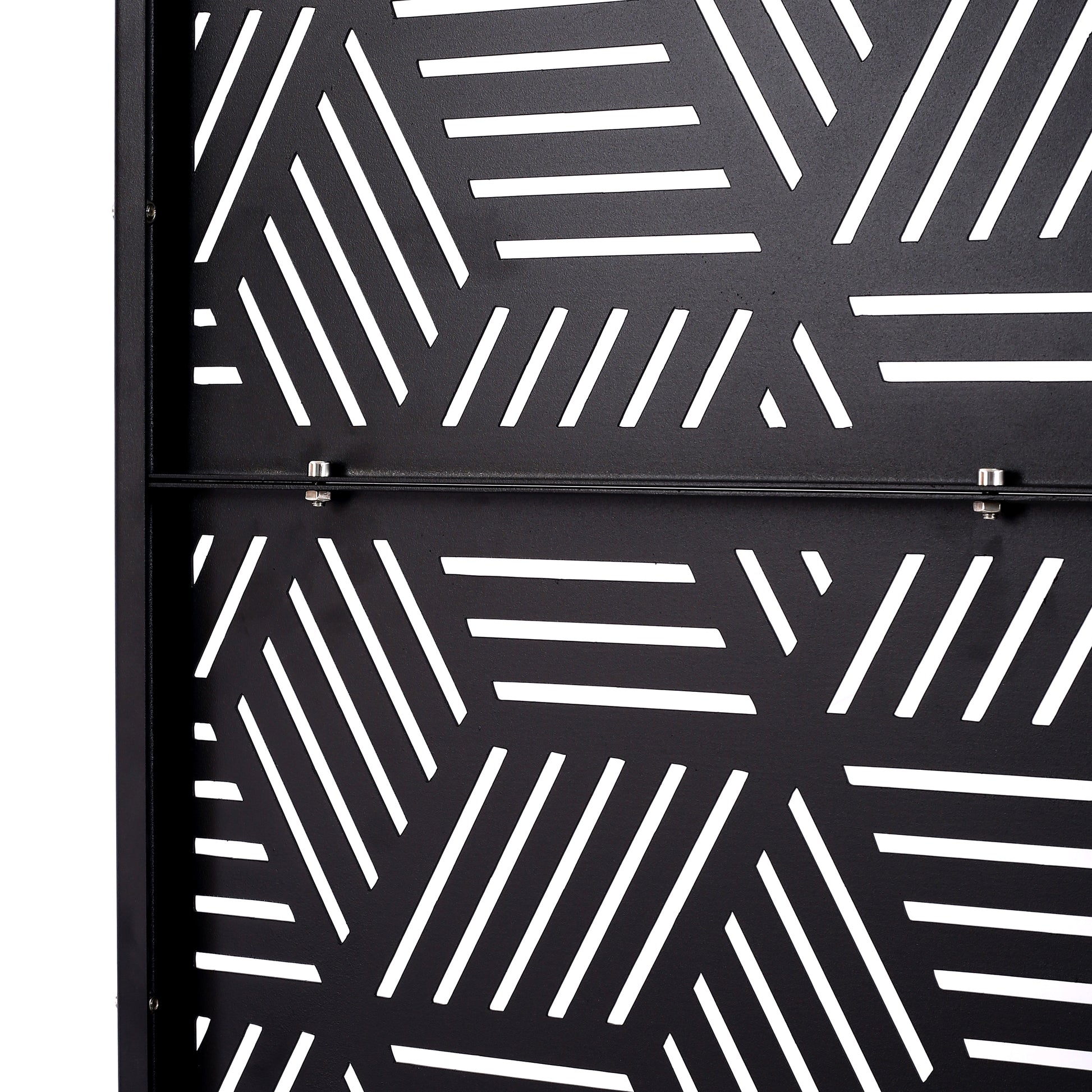 Black metal garden screen with modern geometric cutouts and parallel line design