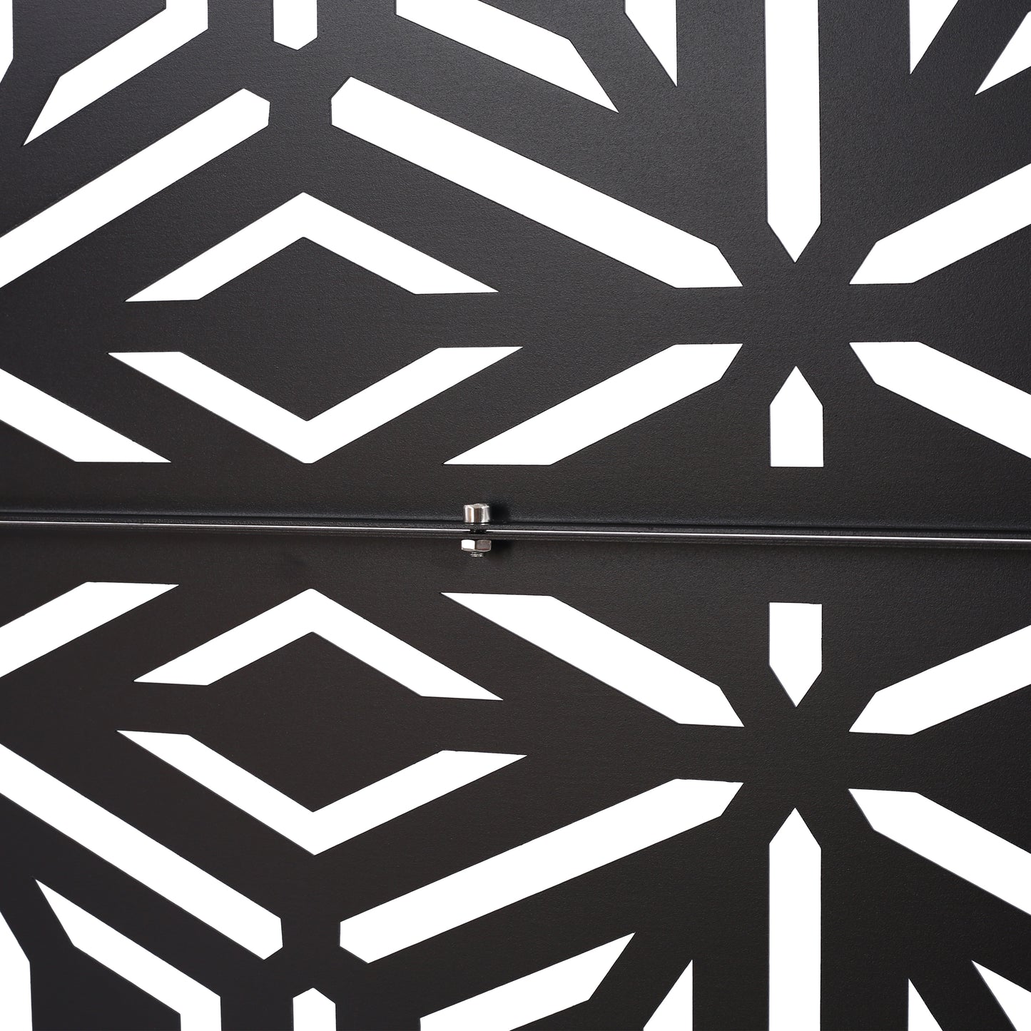 Black metal decorative panel with a white geometric cutout pattern cm