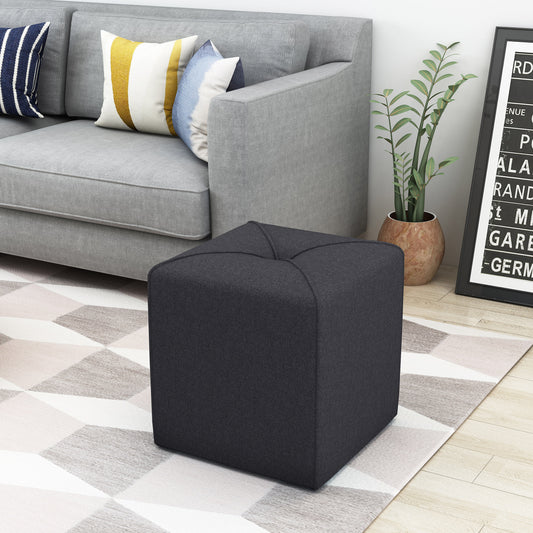 Dark grey fabric ottoman with tufted top and square design