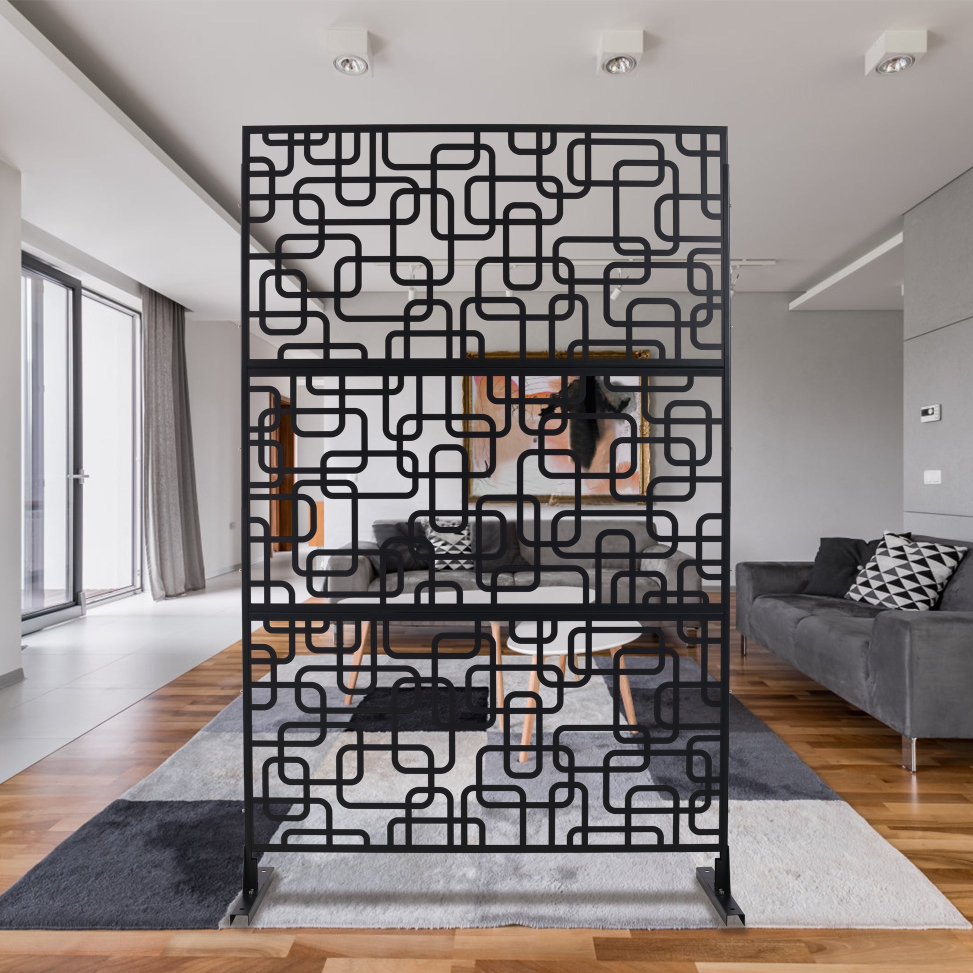 Black decorative room divider screen with an abstract geometric pattern
