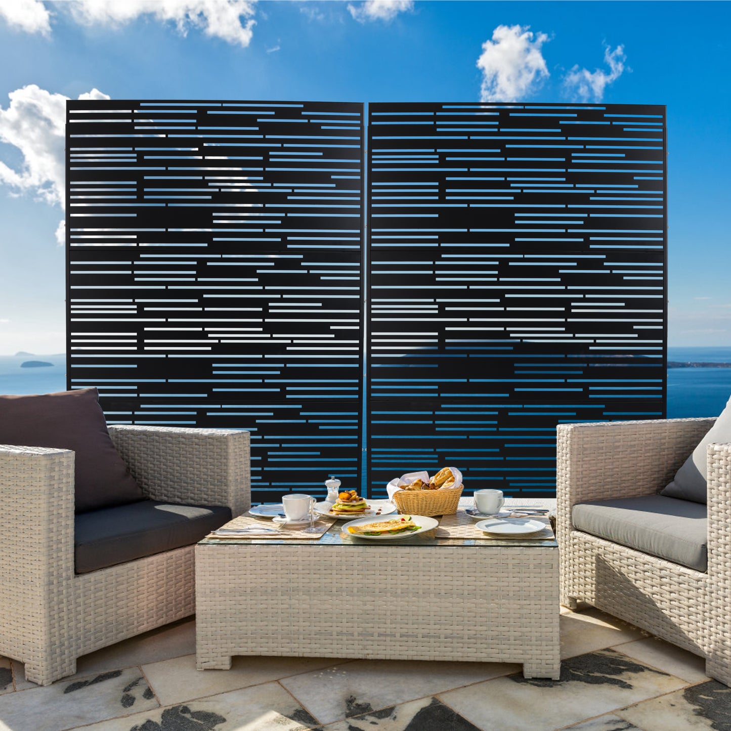 Modern black horizontal slat privacy screen with outdoor patio seating and breakfast table setup