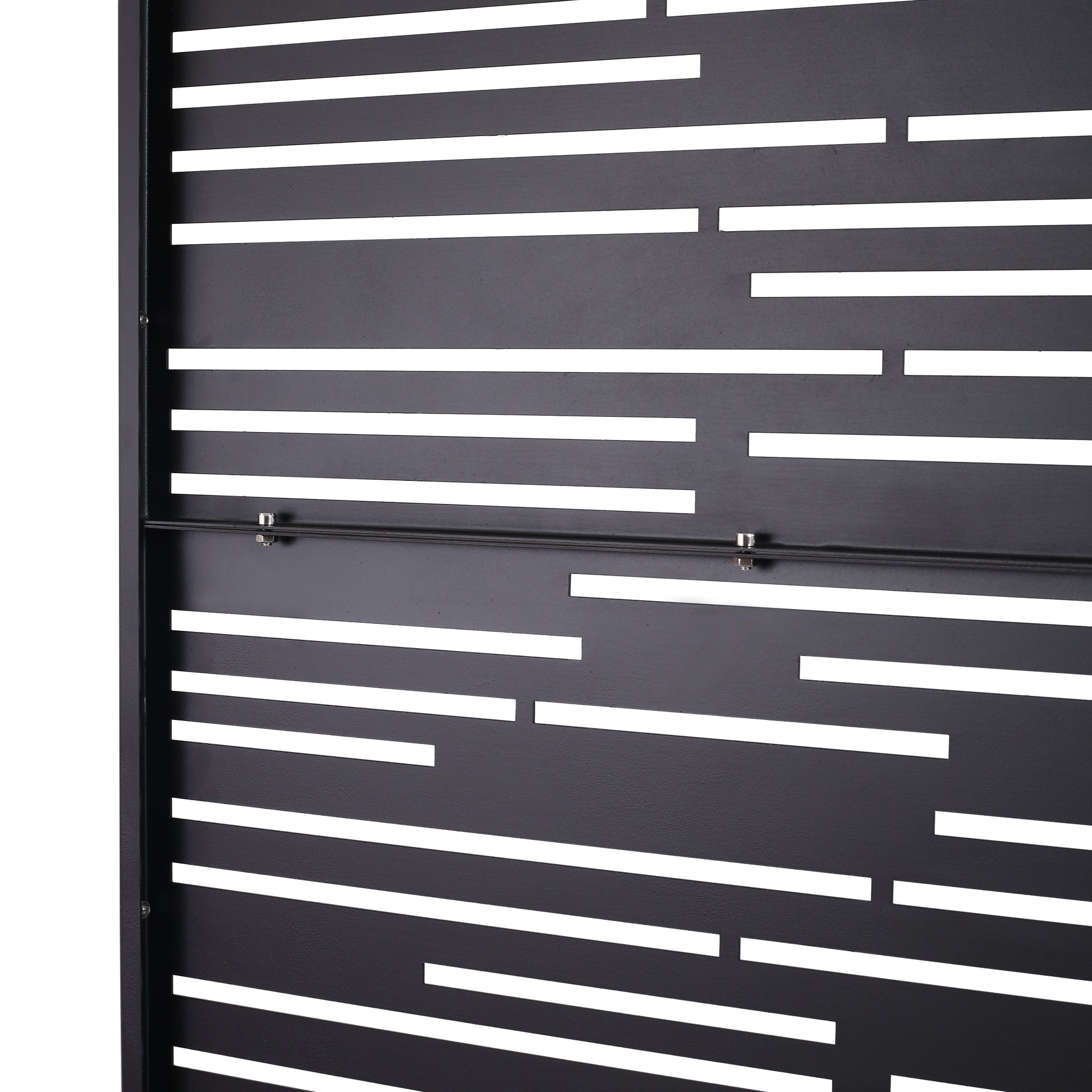 Black metal garden screen with horizontal white stripe cutouts