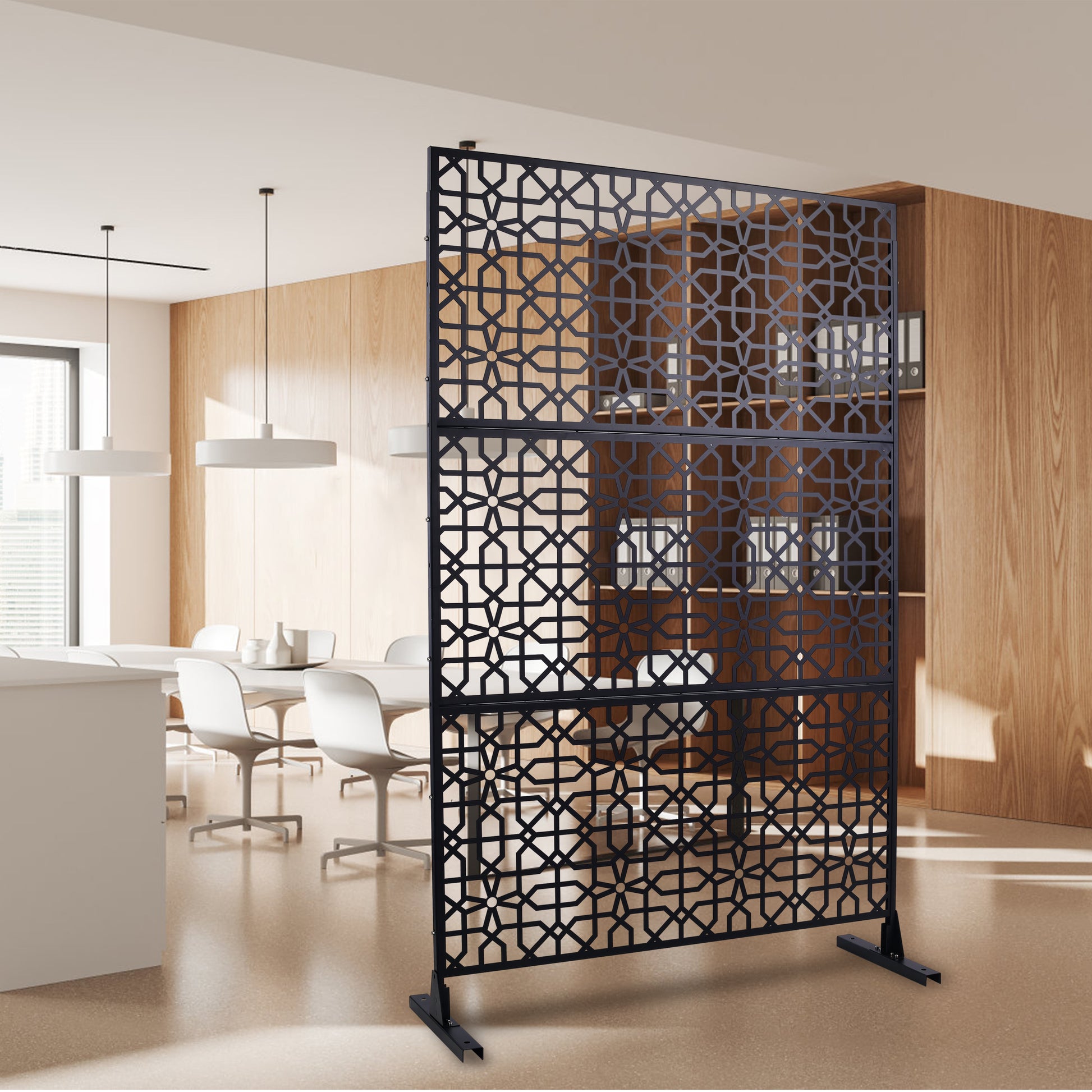 Black metal room divider with geometric lasercut pattern for privacy