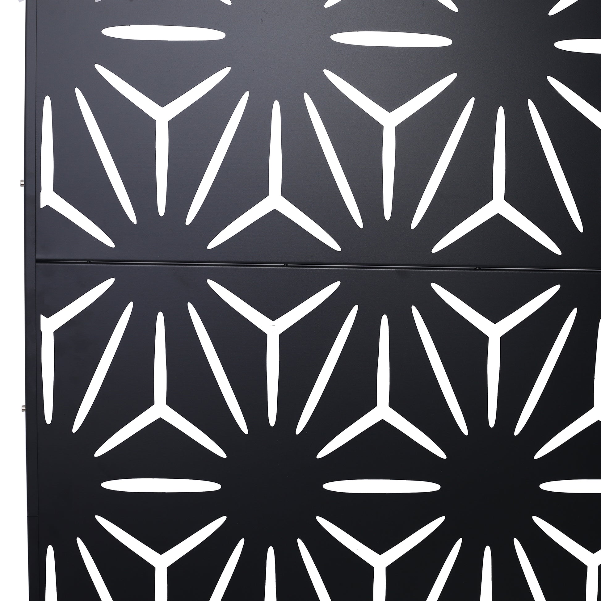 Black geometric perforated metal screen panel with starburst pattern