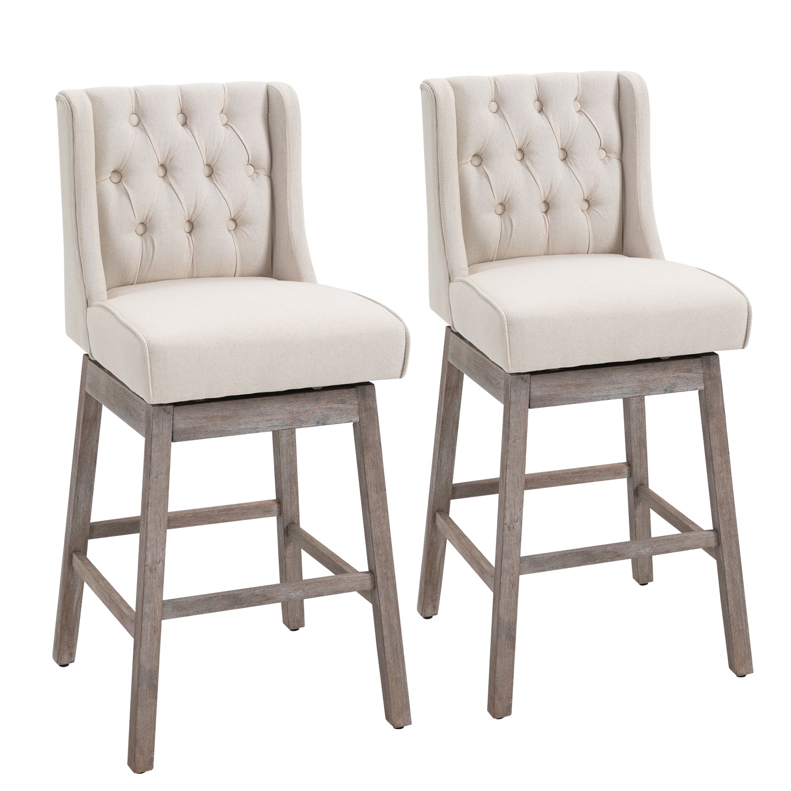 Pair of beige upholstered swivel bar stools with tufted backs and distressed wood legs