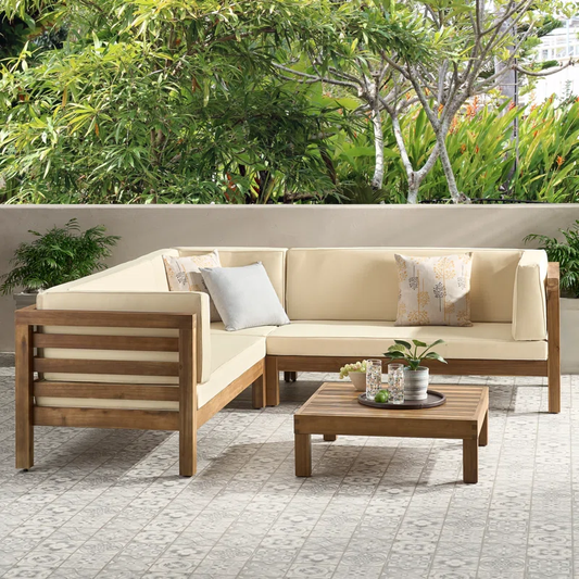 Wood sectional outdoor sofa with beige cushions and a coffee table