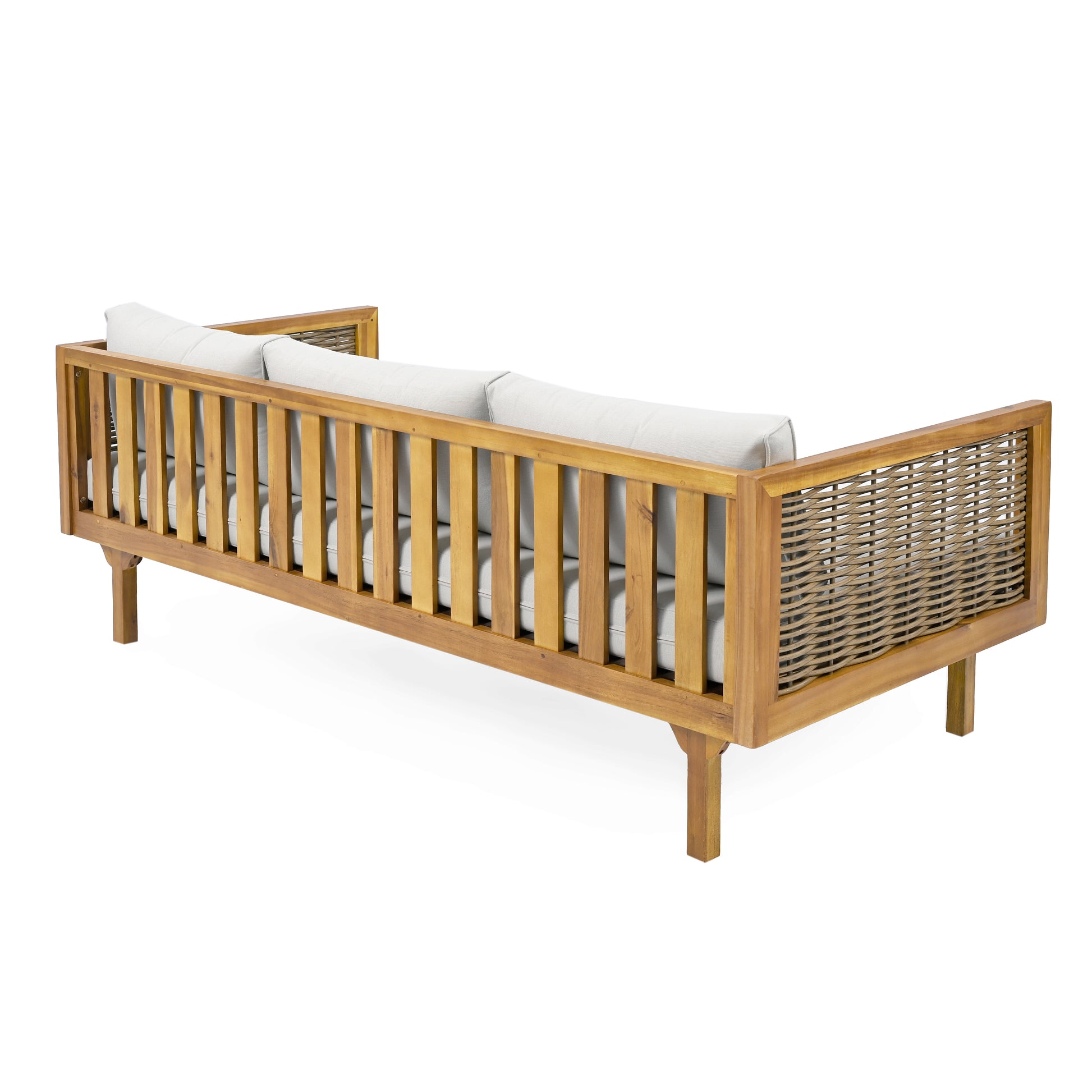 Acacia wood outdoor sofa with woven side panels and plush white cushions