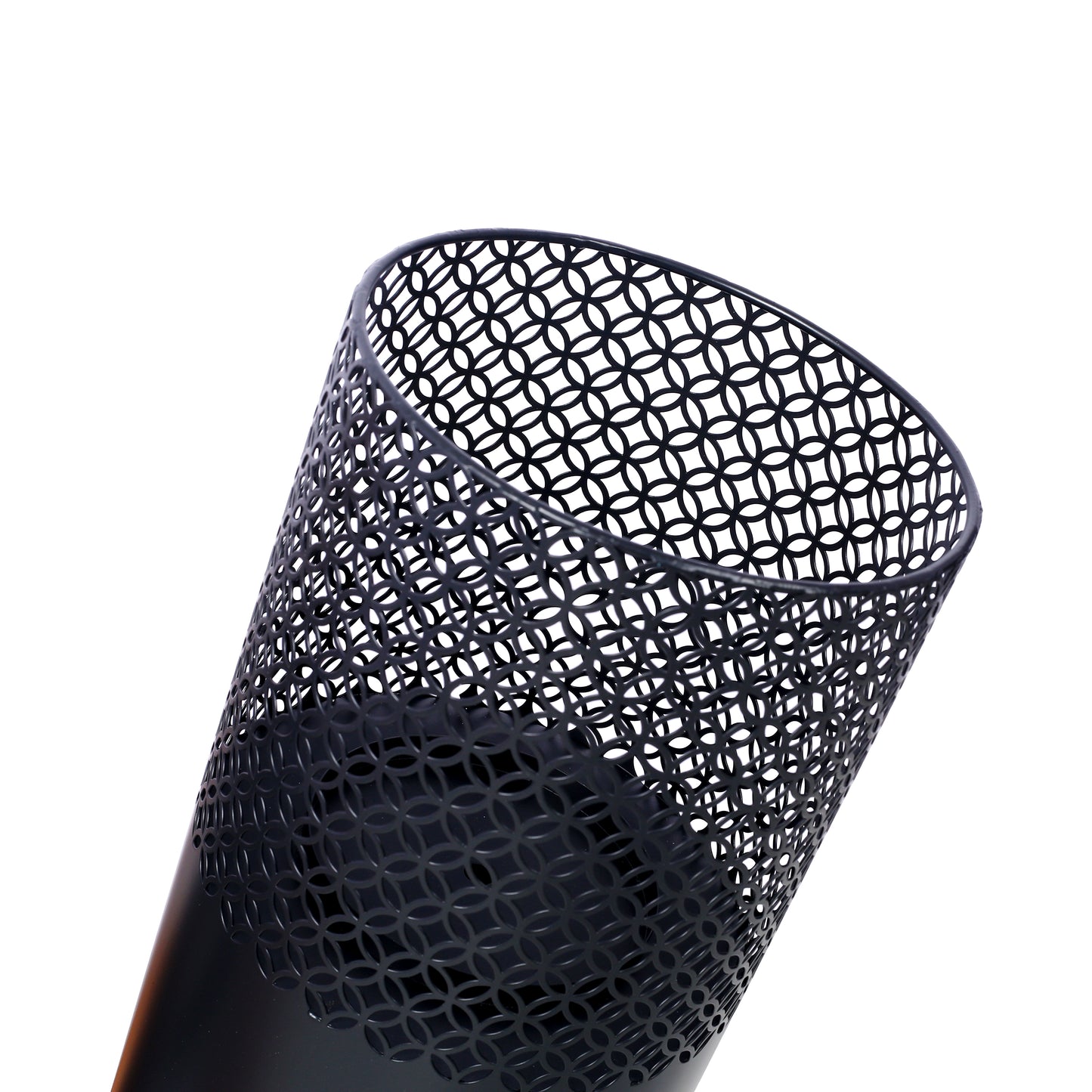 Black metal trash can with intricate geometric cutouts for home office