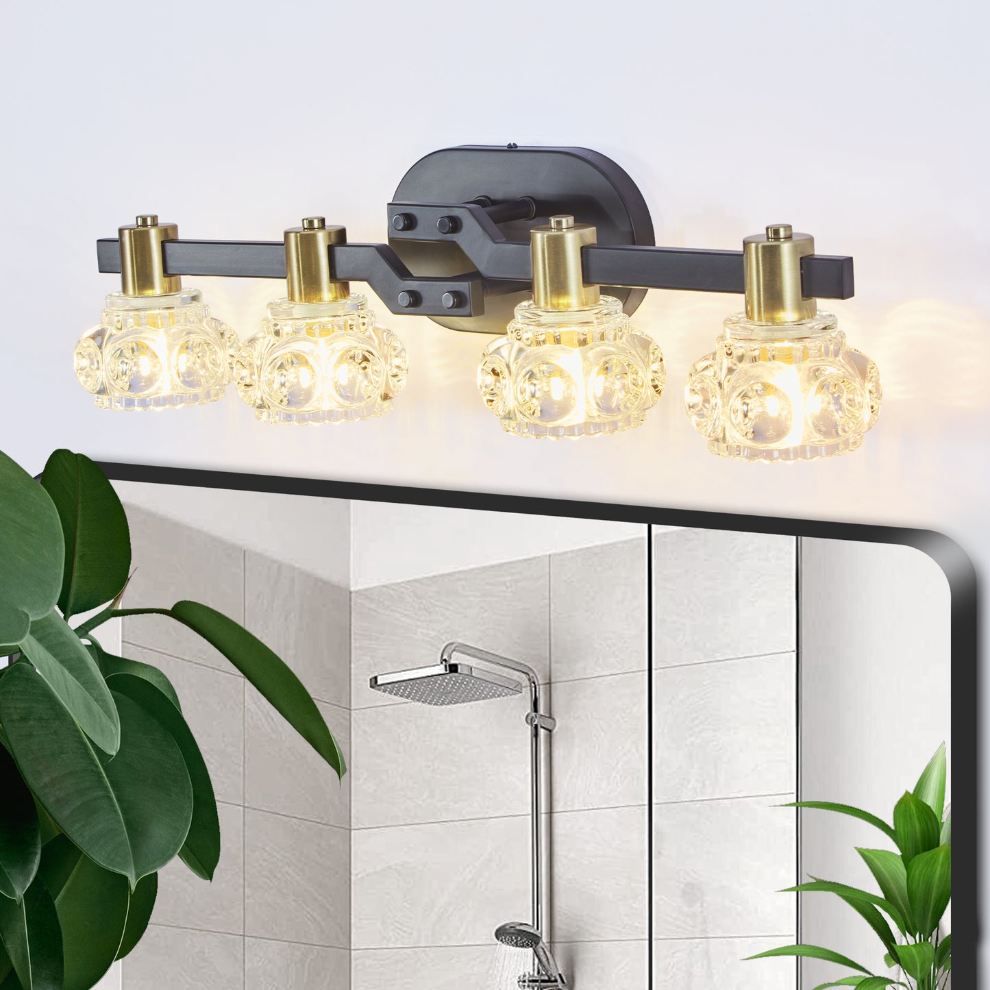 Fourlight bath vanity light with clear glass shades and brass accents