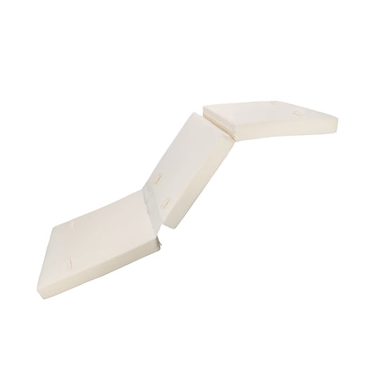 Cream colored trifold mattress with zippered cover ideal for guest sleeping