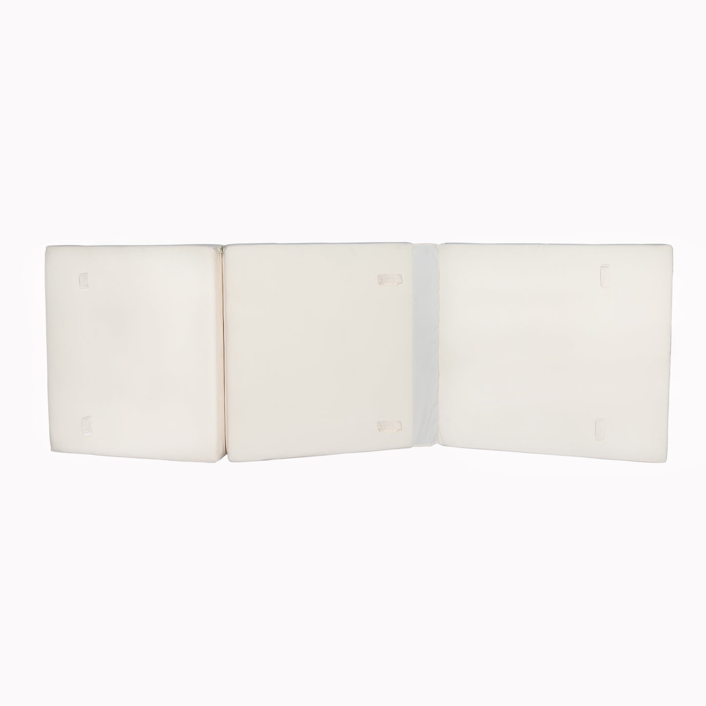 Three white foam floor mattress segments unfolded ready for use