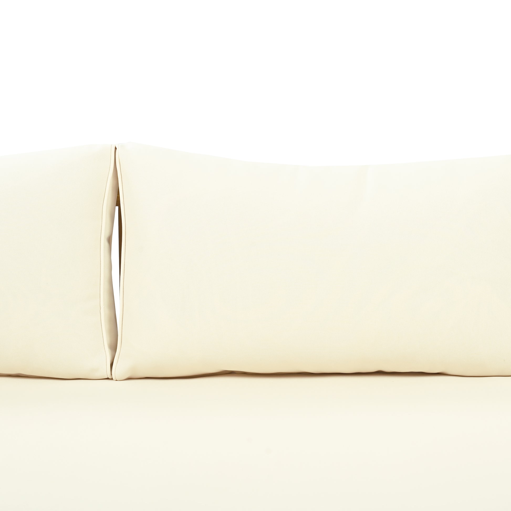 Cream outdoor cushion with textured fabric and stitched seam detail