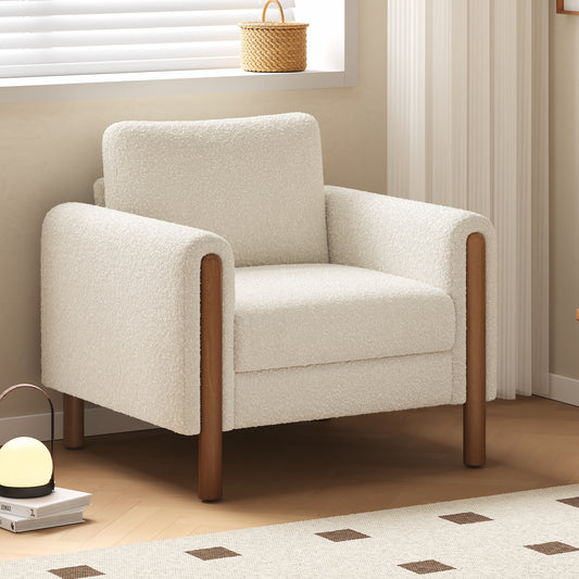 Plush cream boucle armchair with wooden legs perfect for a cozy living room