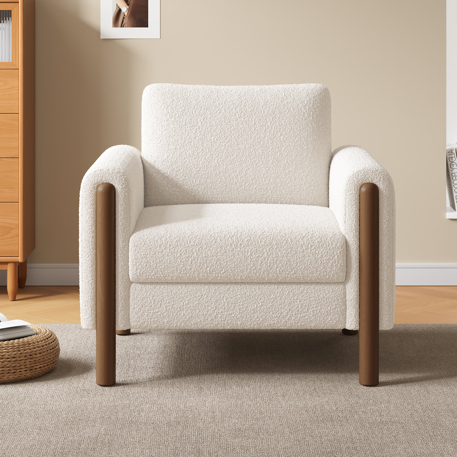 Cozy ivory boucle armchair with rounded brown wooden legs