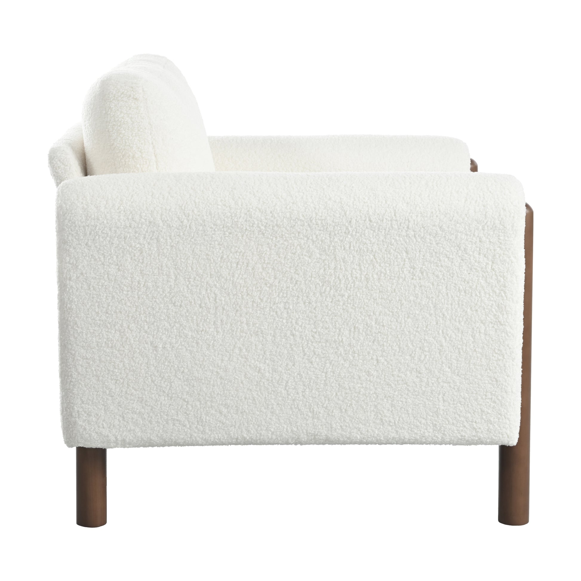 White boucle armchair with brown wooden legs side view