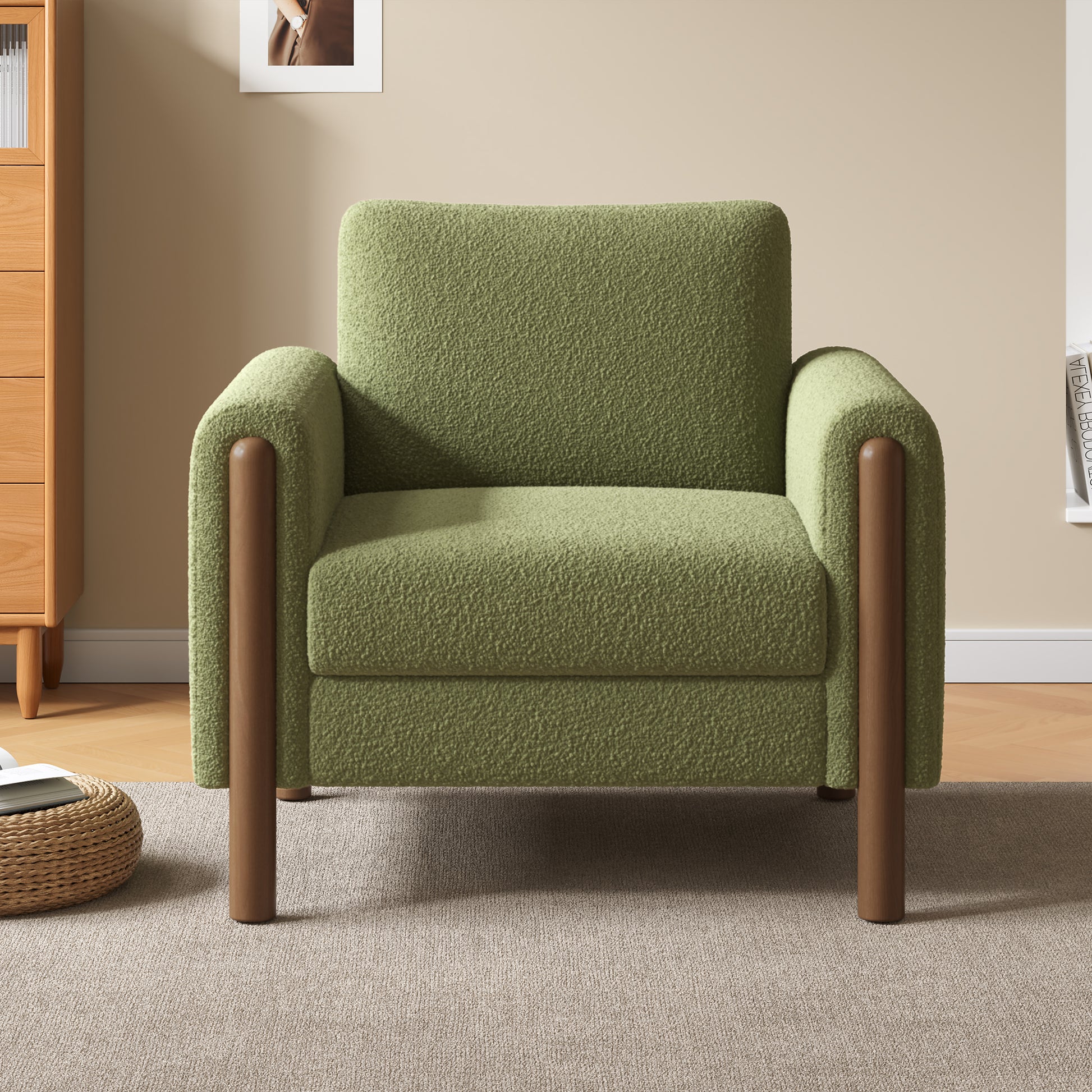 Cozy armchair in textured green fabric with warm wood legs perfect for a modern living room
