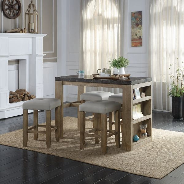 Fourpiece counter height dining set with gray upholstered stools and a marblelook top