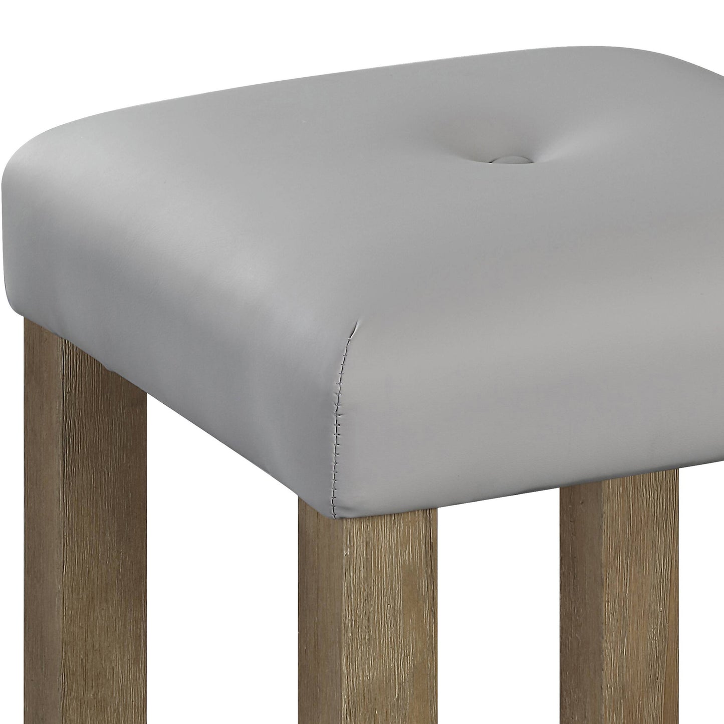 Light gray faux leather bar stool with button tufting and natural wood legs