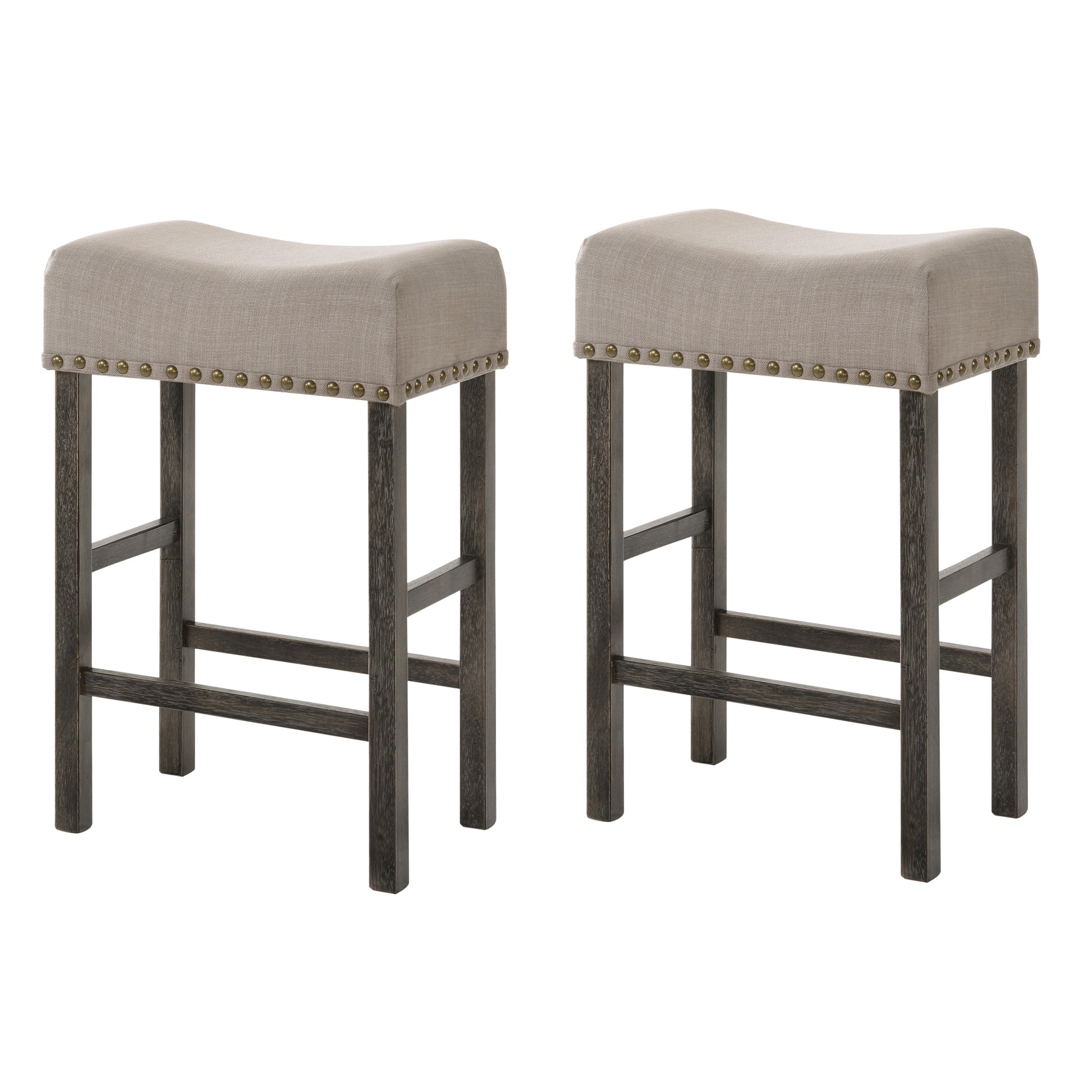 Two beige upholstered saddle bar stools with dark wood legs and brass nailhead trim
