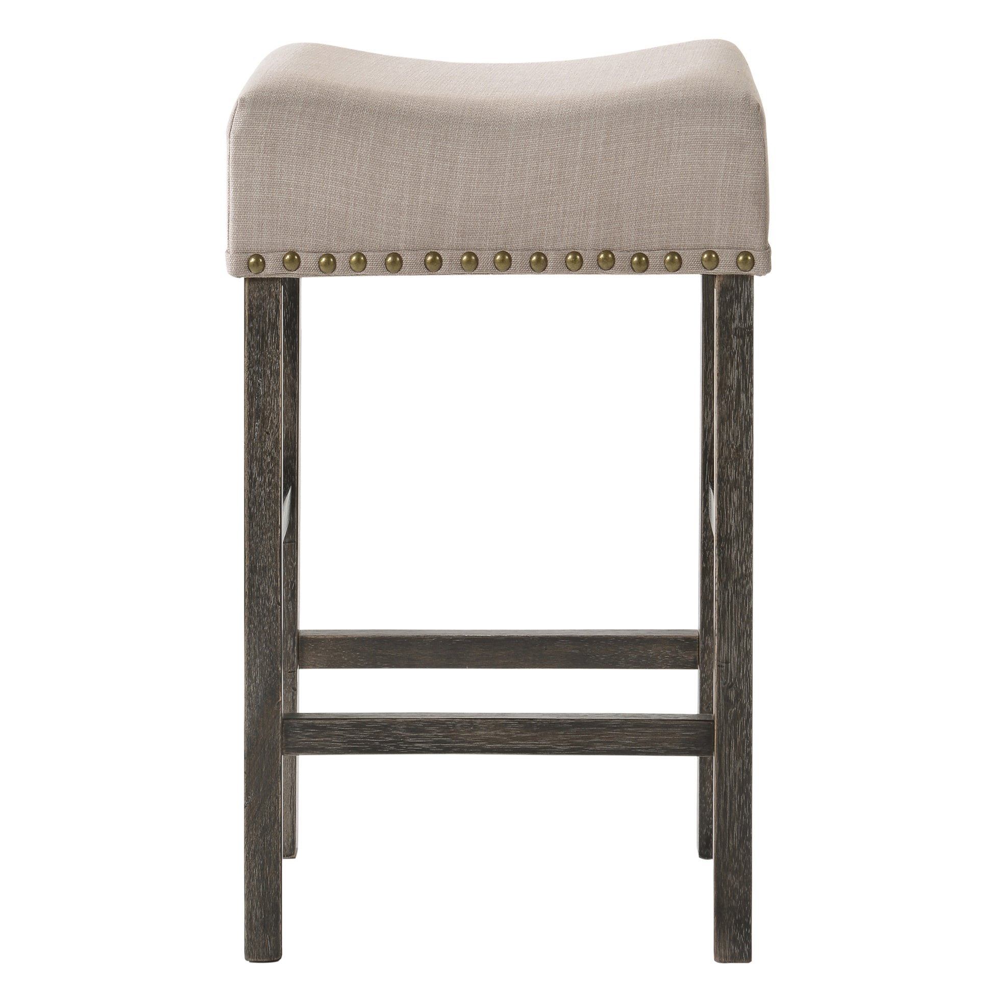 Textured beige fabric saddle stool with decorative brass nailhead trim and dark wood legs