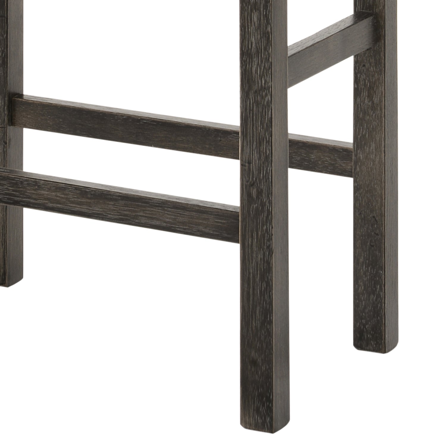 Closeup of dark distressed wood bar stool legs with crossbars