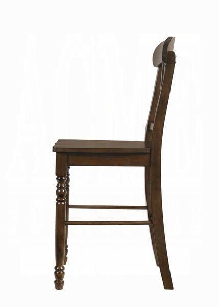 Dark brown wooden bar stool with turned legs and curved back