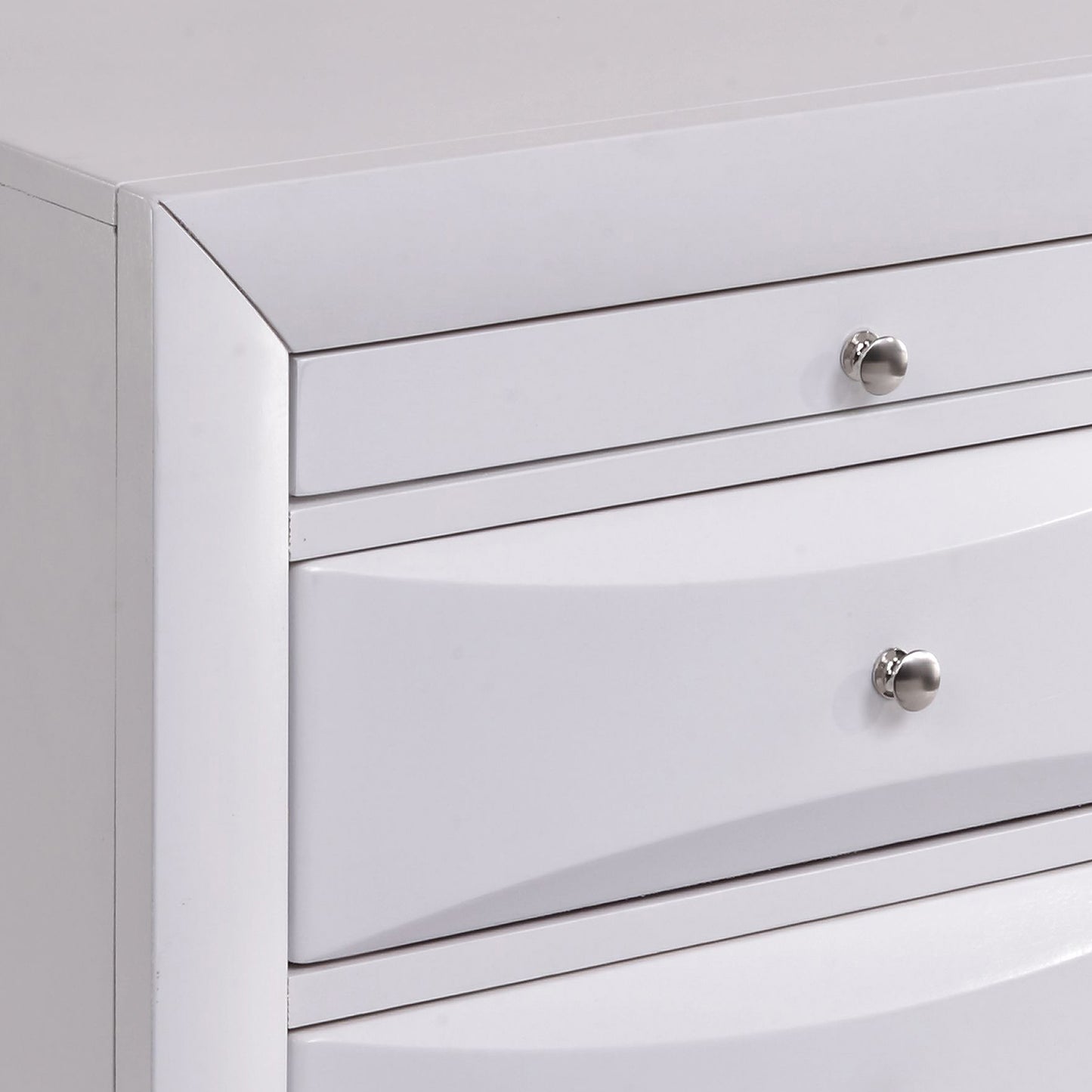 White modern dresser with three smooth drawers and brushed nickel knobs clean design