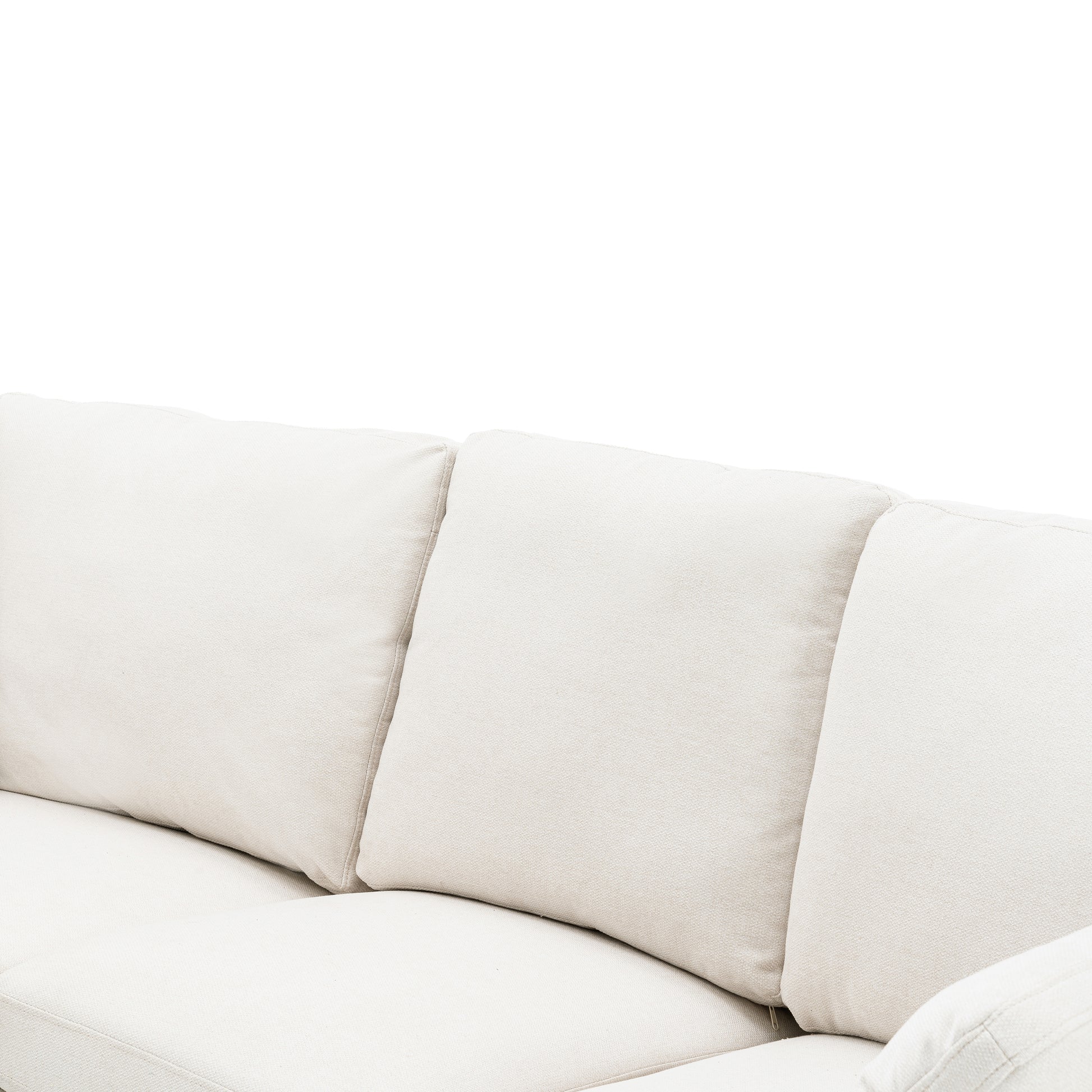 Closeup of a modern ivory linen sectional sofa showing plush cushions and fabric texture