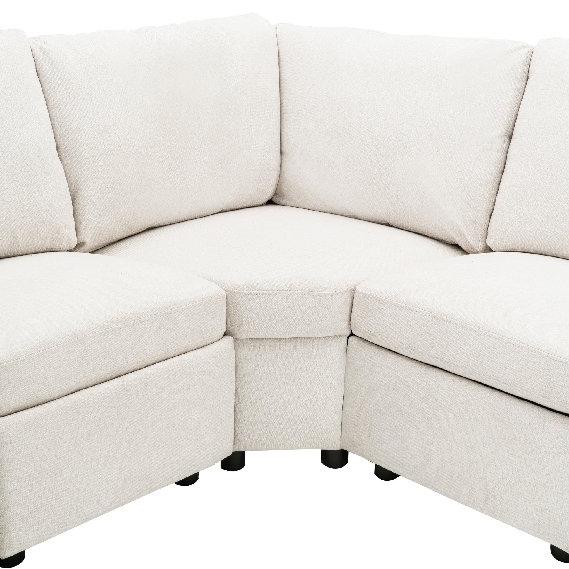 Cream fabric sectional sofa with plush cushions and dark wood legs