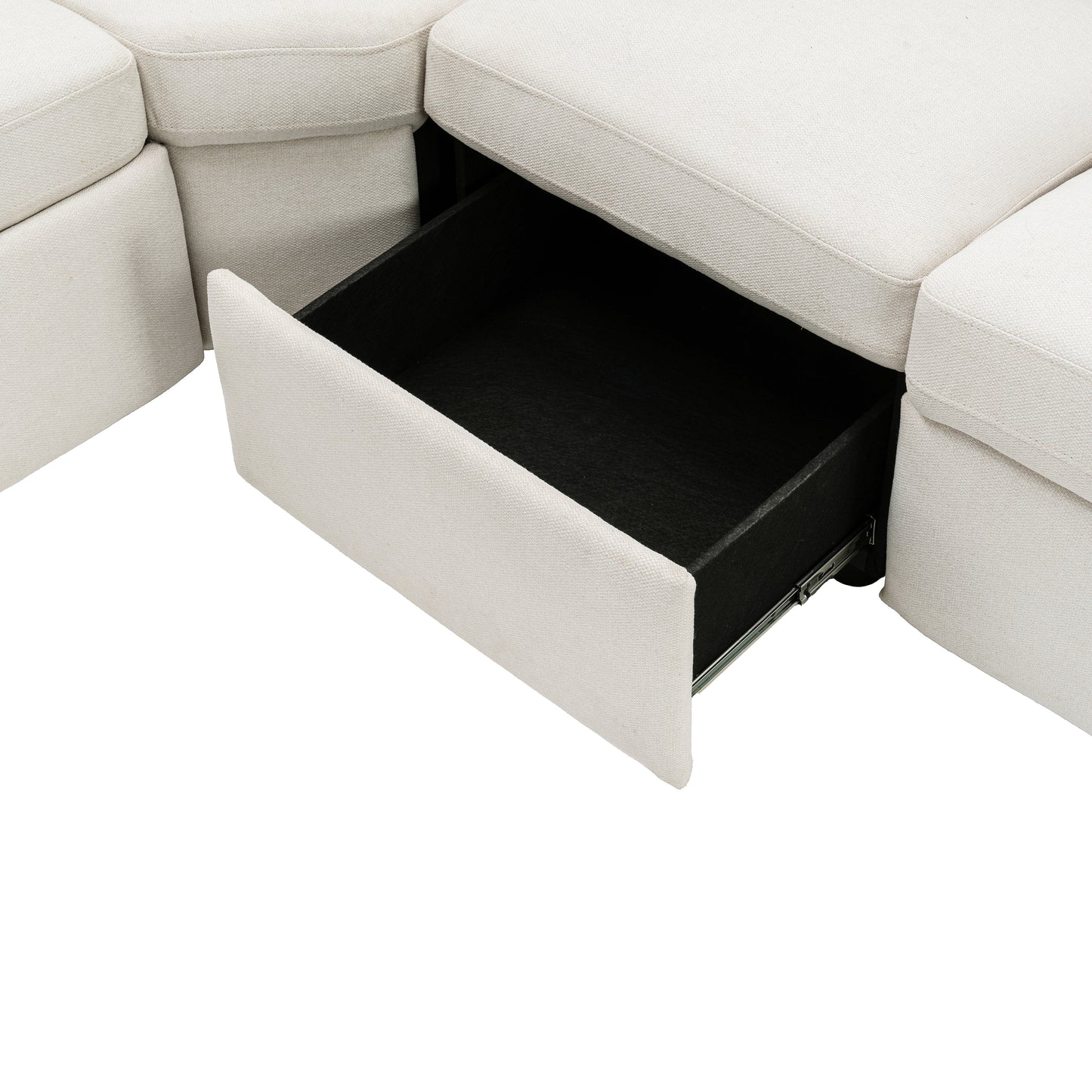 Cream fabric sectional sofa with an open storage drawer revealing black interior