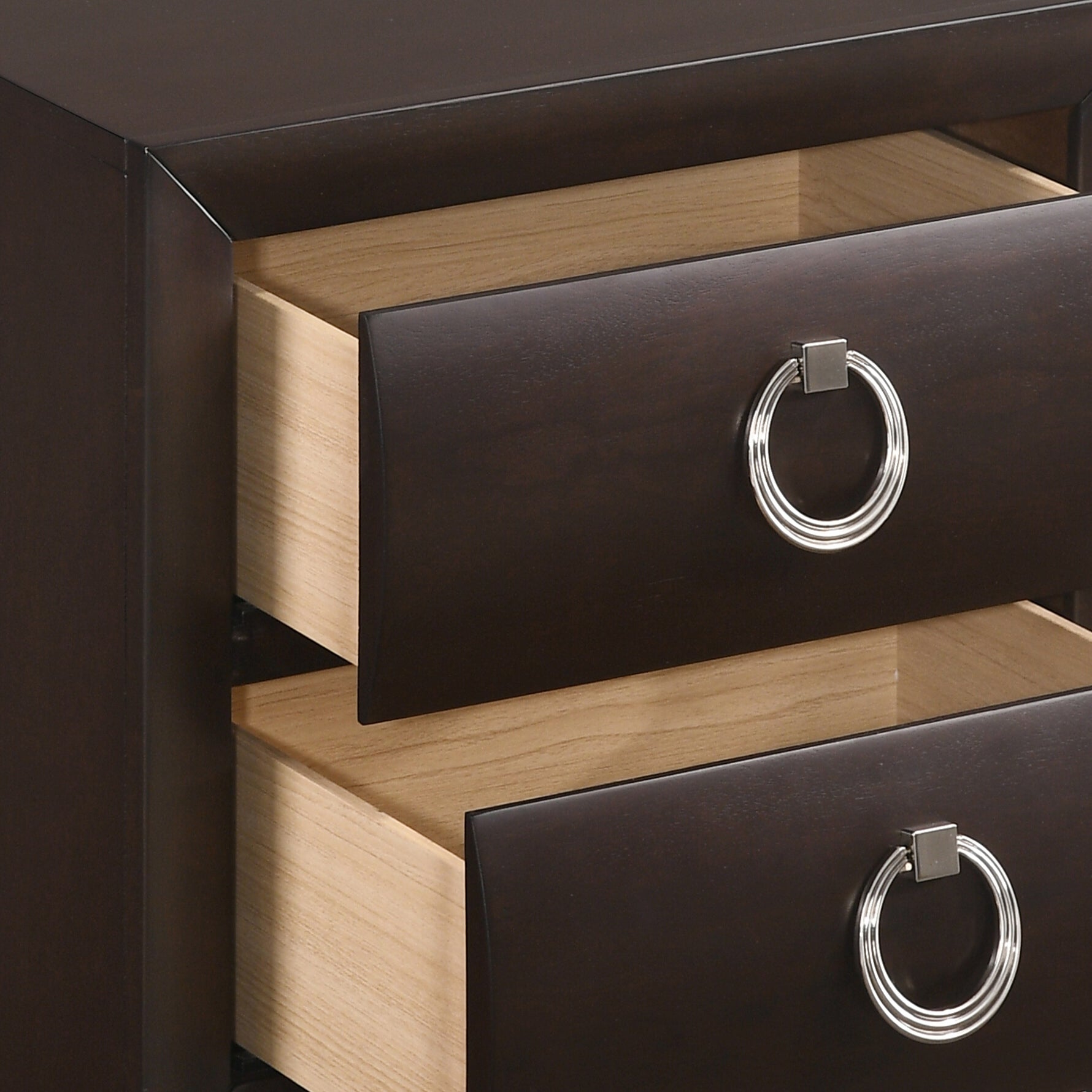 Dark wood nightstand with two open drawers and silver ring pulls