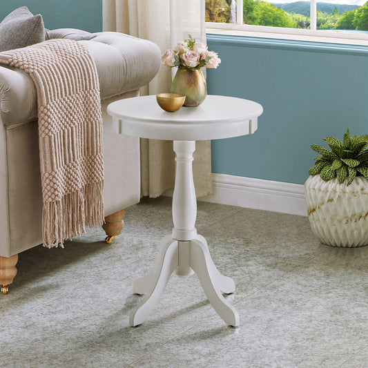 White pedestal accent table with decorative vase and bowl for living room
