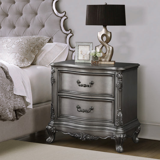 Ornate grey finish nightstand with two drawers and carved details ideal for bedroom storage