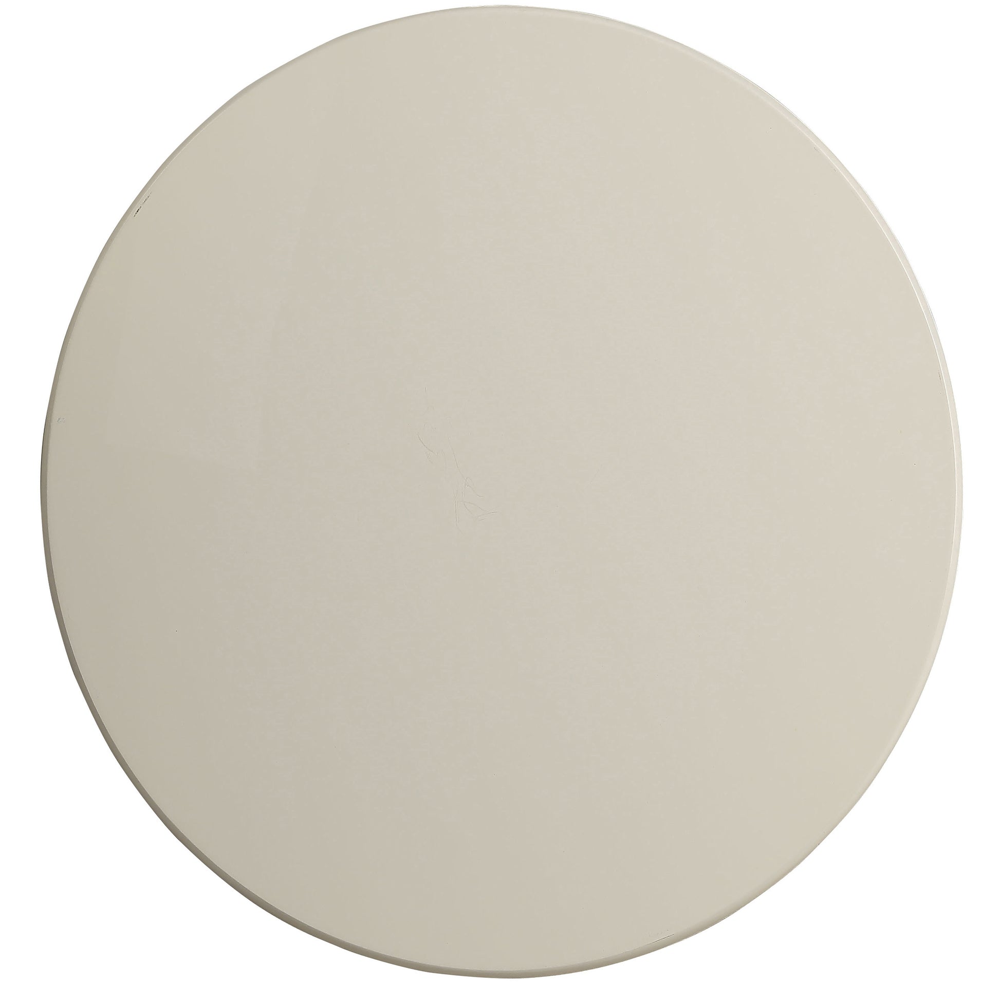 Round beige laminate tabletop with subtle surface scratches