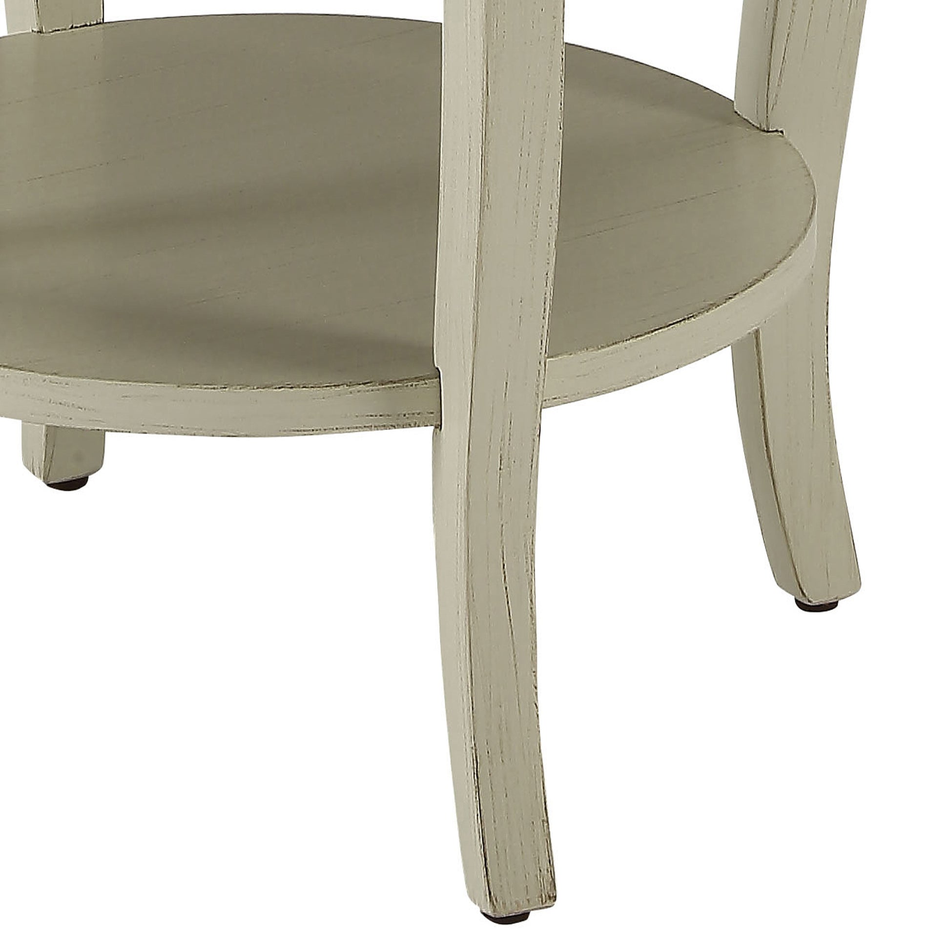 Cream painted wooden end table with curved legs and a circular shelf