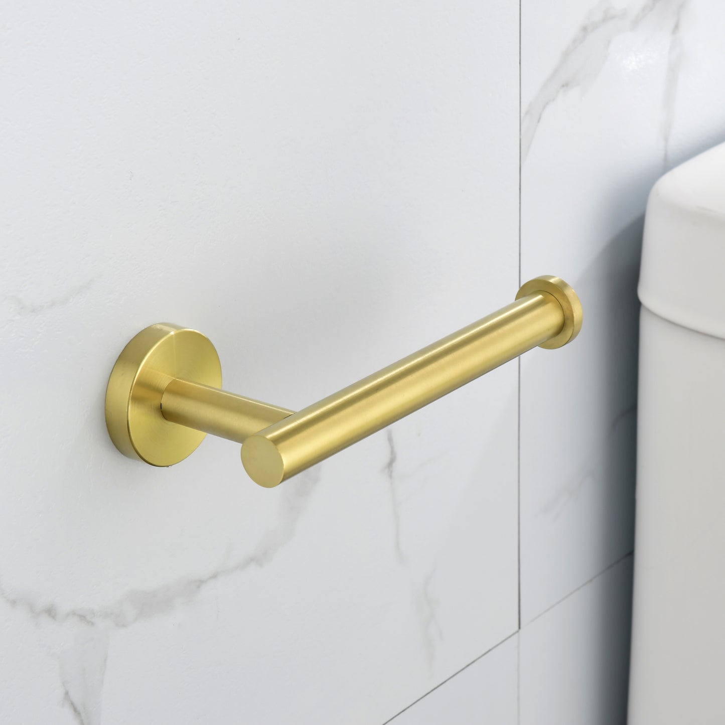 Brushed gold wallmounted toilet paper holder with clean modern design