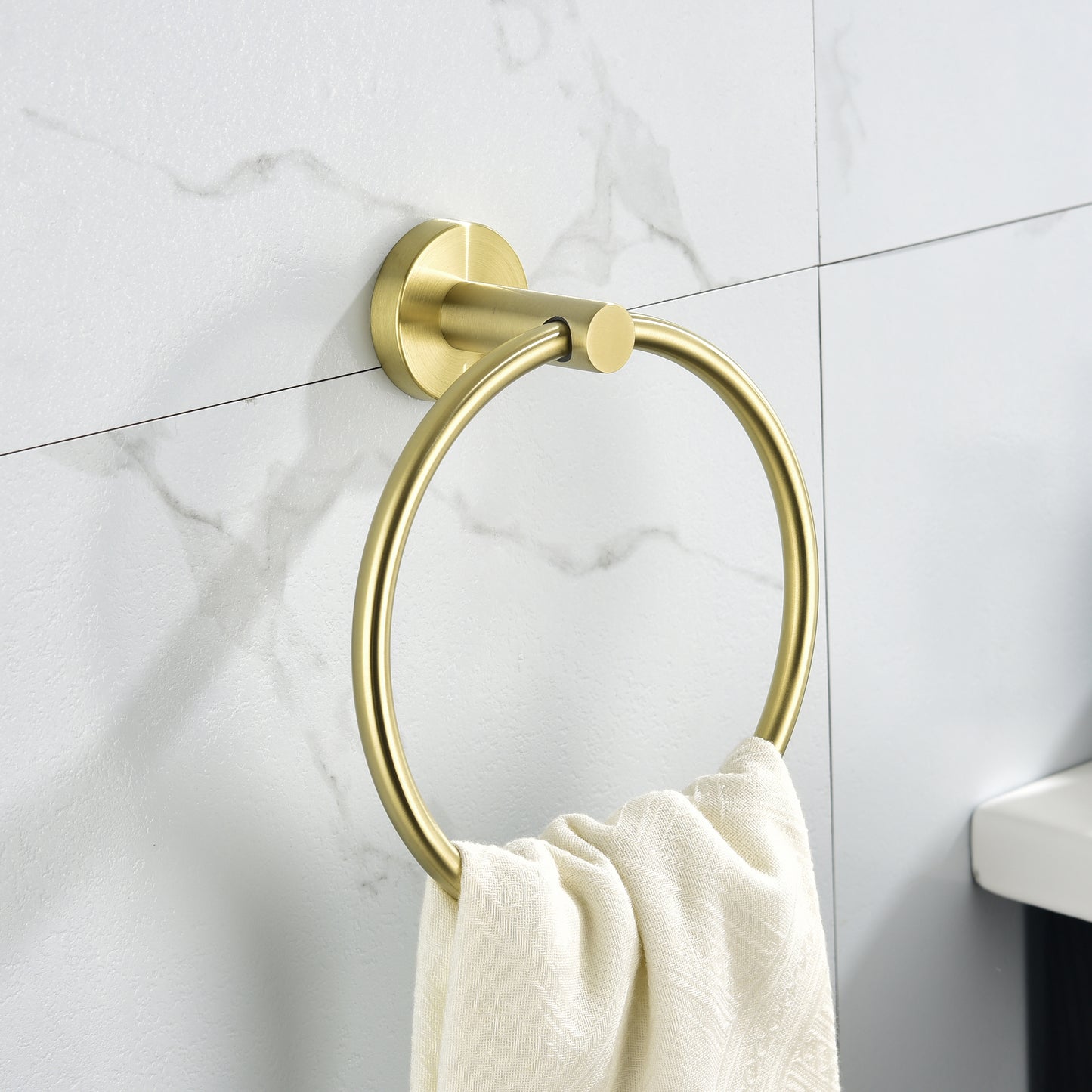 Modern brushed gold towel ring with a circular design ideal for contemporary bathrooms