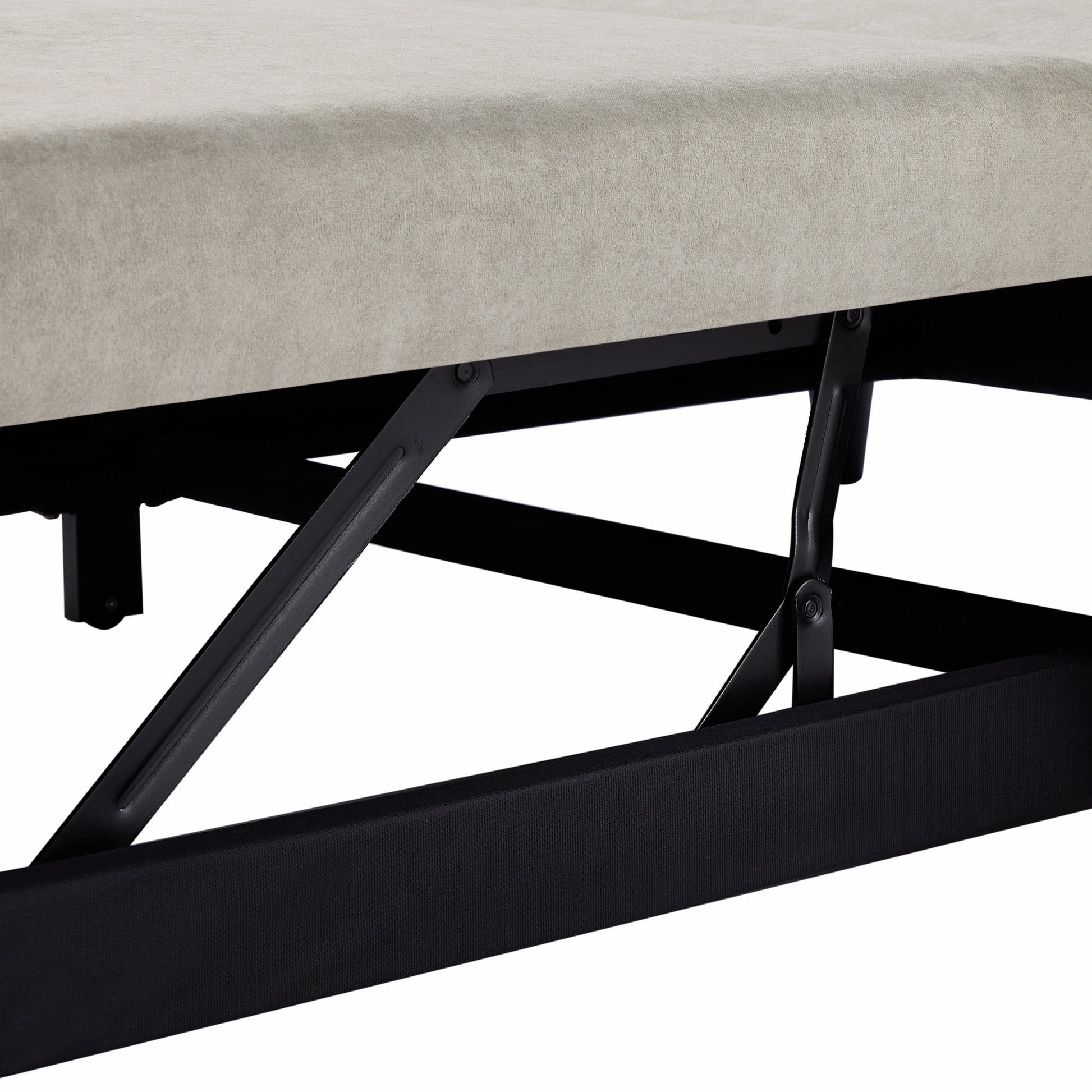 Close up of a beige upholstered bed frame with black metal liftup storage mechanism